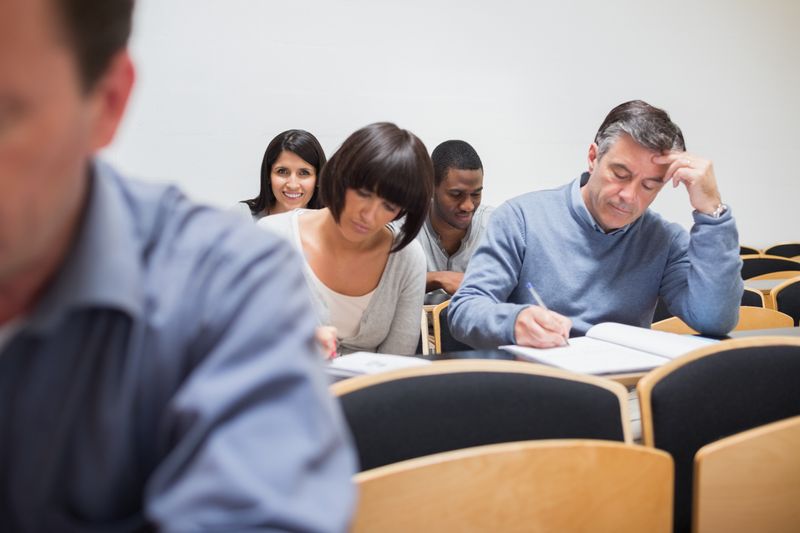 Adult class taking notes