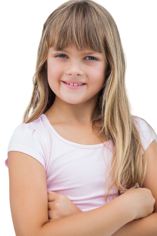 Beautiful little girl smiling with her arms crossed 