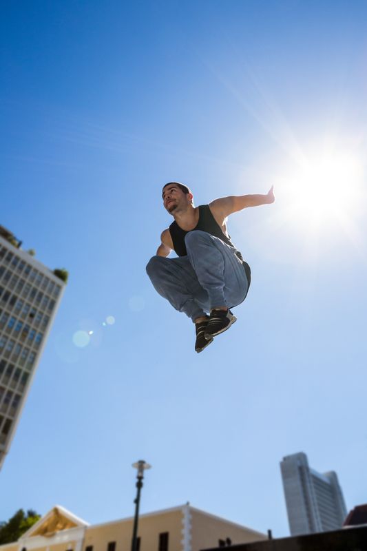  Man doing parkour in the city