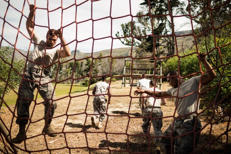 Soldiers performing training exercise on net