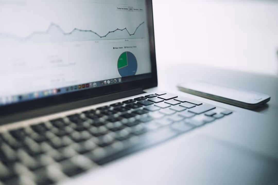 Image of an open laptop - Tips on how to understand your KPIs as a content creator - Image
