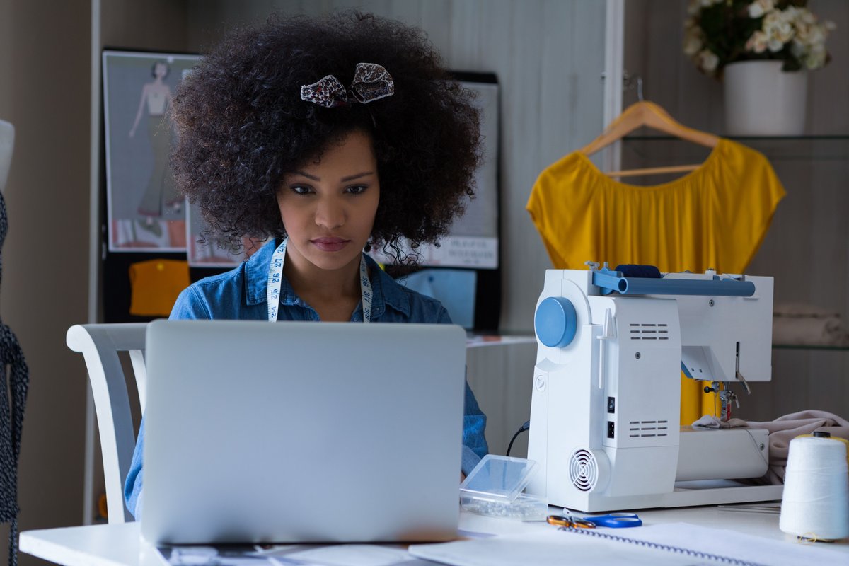Photo of fashion blogger in her studio - A guide on how to start a fashion blog for a beginner - Image