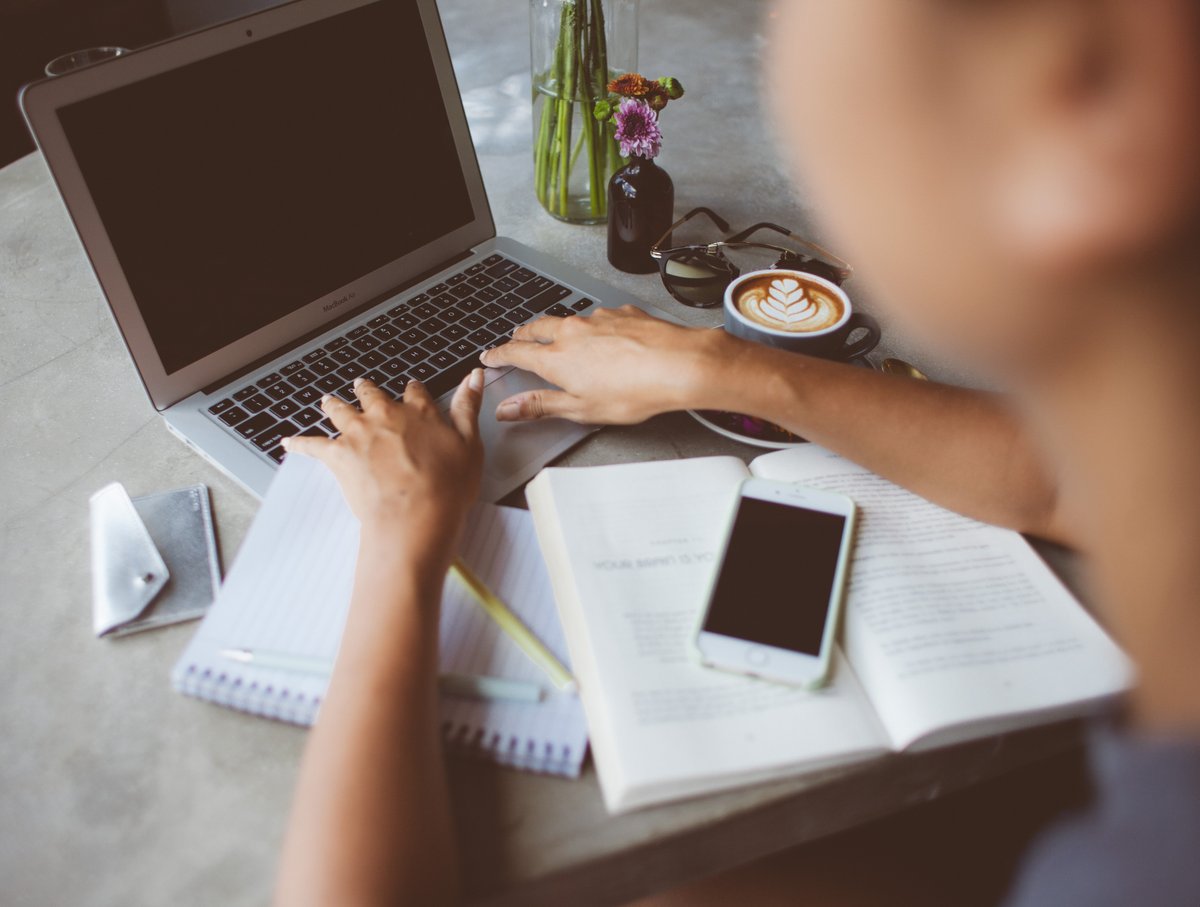 A woman works on a laptop - Some simple tips on how to develop your startup business online - Image