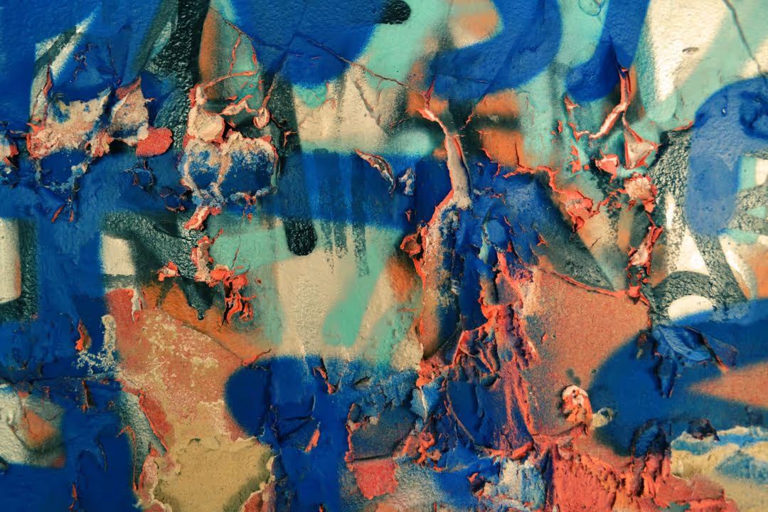 Image of colorful paint peeling off wall - A selection of on trend background ideas for your next design in 2021 - Image
