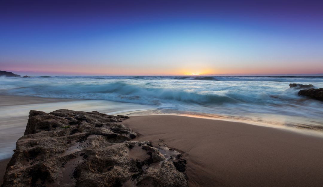 Image of the beach at sunrise - A selection of great images for virtual Zoom backgrounds from the PikWizard team - Image