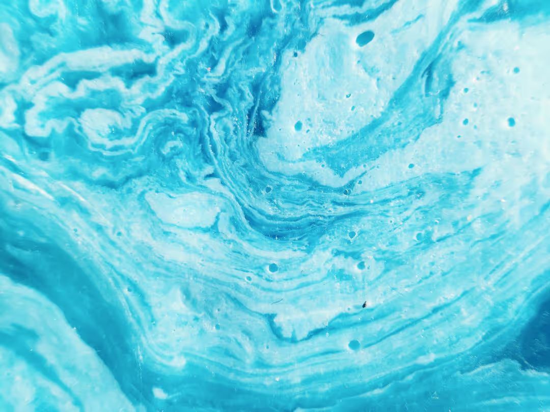 Image of a swirling blue liquid foam background - A selection of on trend background ideas for your next design - Image