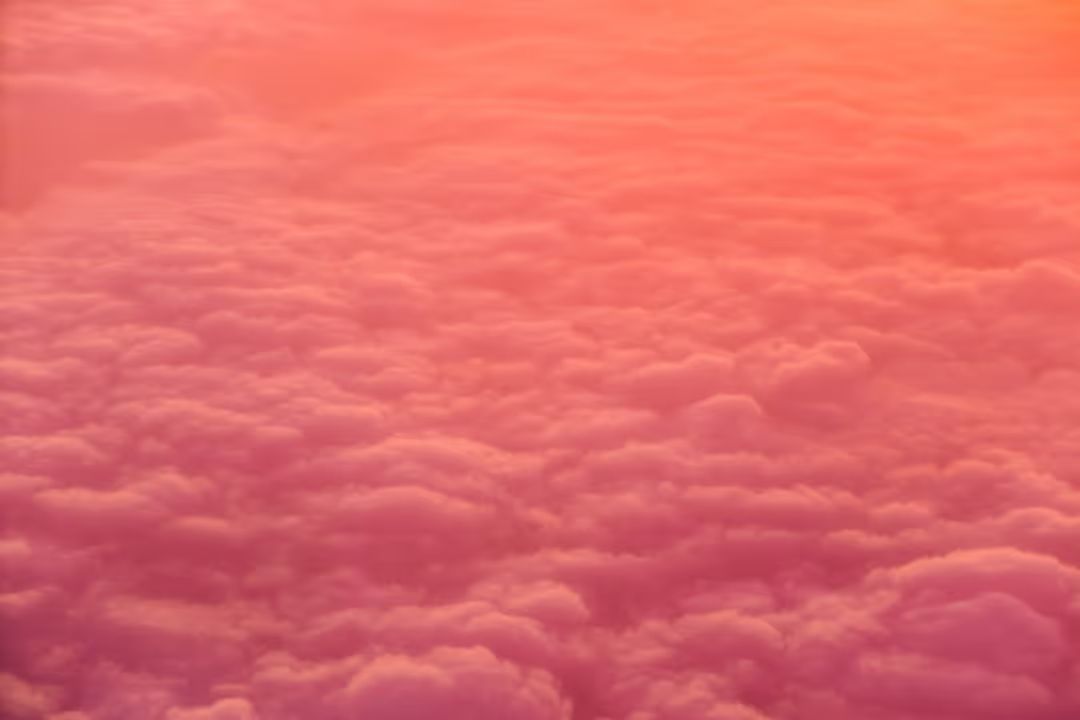 Image of pastel coloured clouds at sunset - A selection of on trend background ideas for your next design - Image