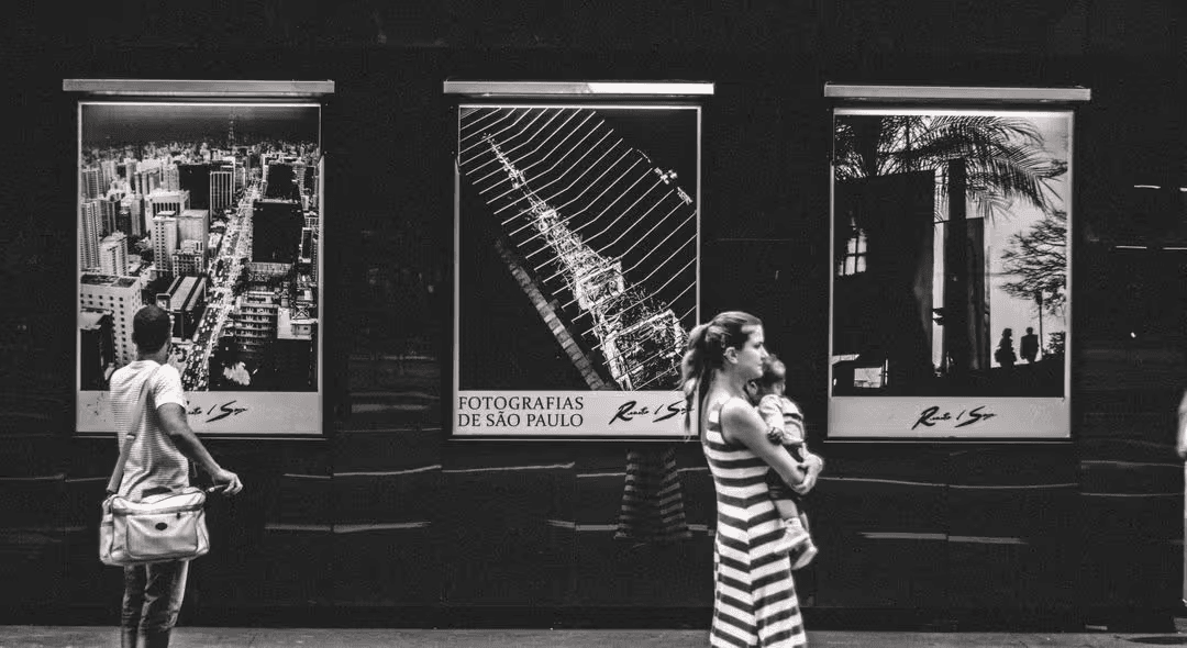 Printed poster in a black and white on wall in urban area - Why do you need to understand the conversion of inches to pixels when resizing images, and what free online tools can help you make it easy - Image