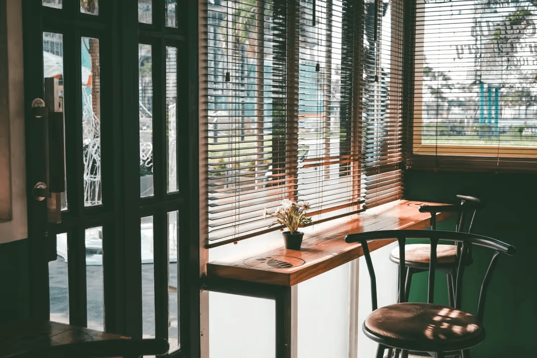 Interior of a store with chairs and windows - Retail marketing strategy tips and tricks to drive sales and save money - Image