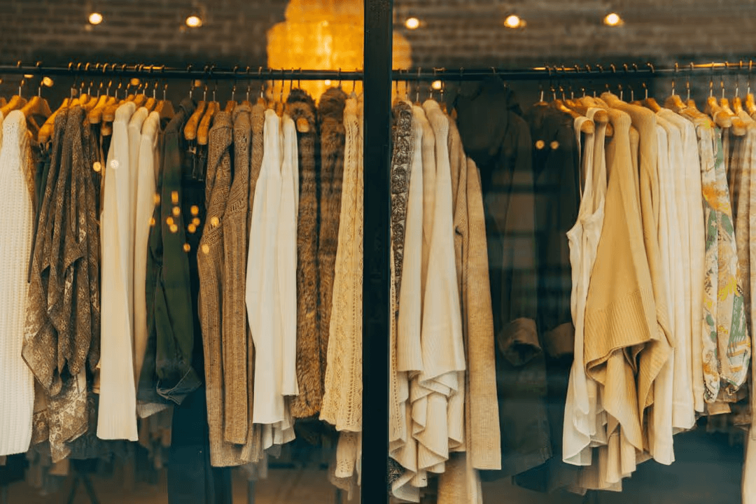 Rack of clothing with hex values - How to create a perfect modern color scheme for your website - Image