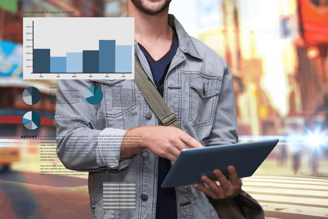 Image of a man working on tablet with pie charts and bar charts - How to make a beautiful mood board with free online tools - Image