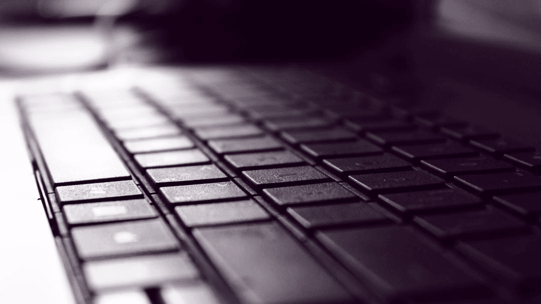 Close up image of a computer keyboard - Be aware of online copyright law - Image