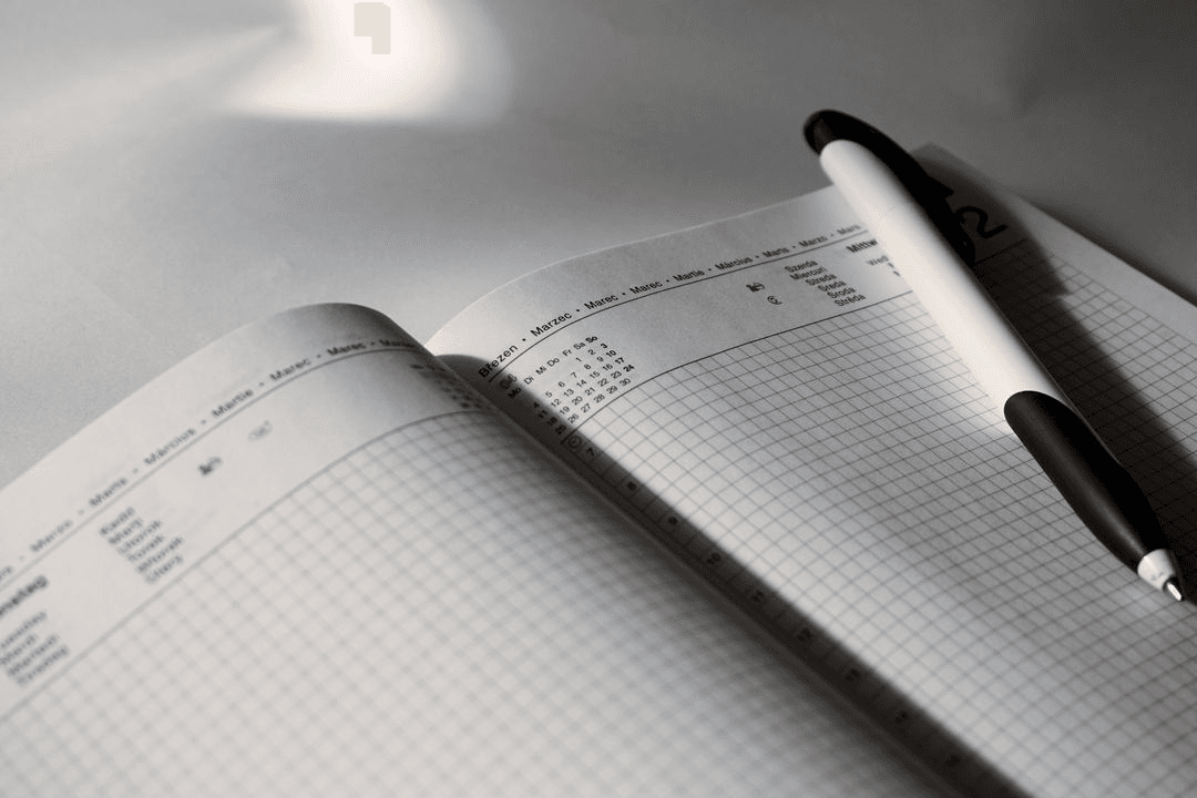 Image of an opened empty agenda - Post regularly on social media - Image