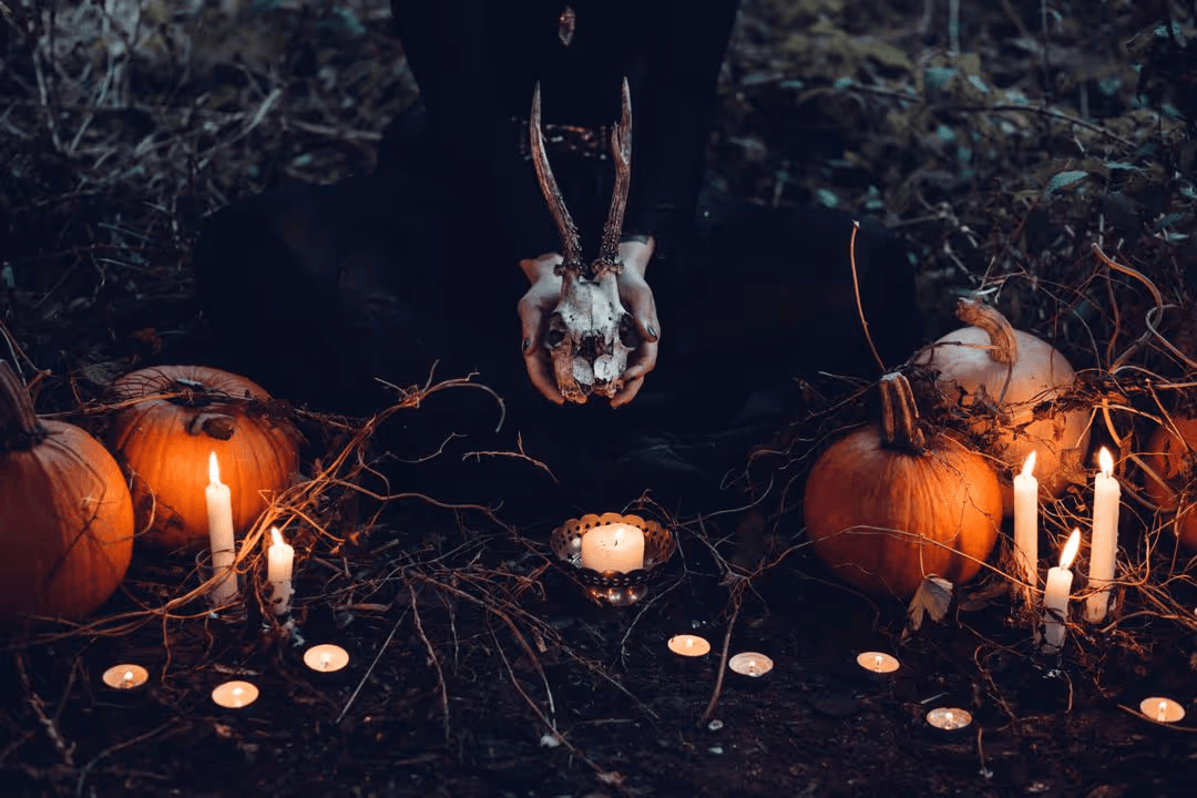 Image of pumpkins and candles on the ground - A selection of engaging Halloween images from the PikWizard team - Image
