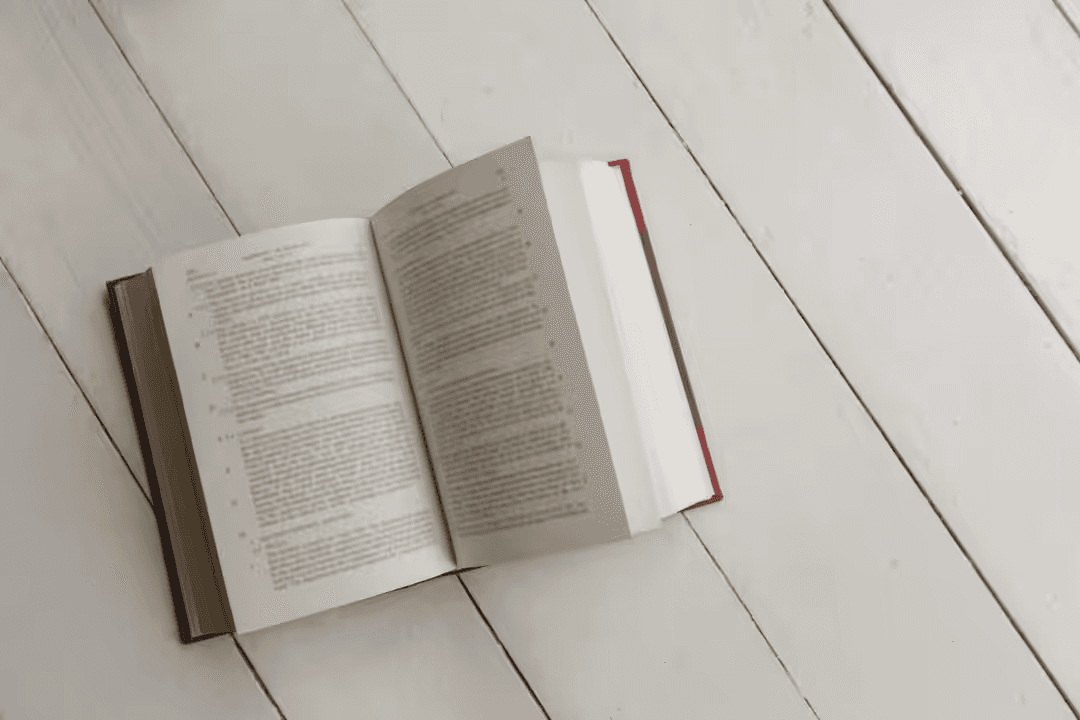 Image of an open book on a table - Six types of graphics you need to know for business marketing - Image