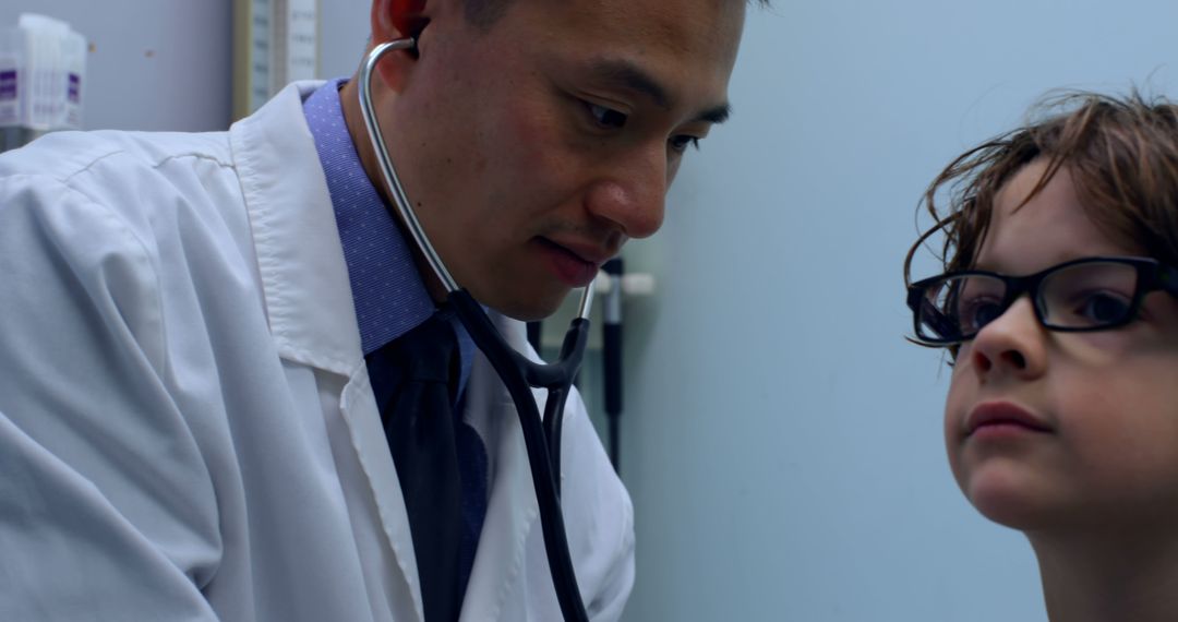 Doctor Examining Child with Stethoscope in Medical Office - Free Images, Stock Photos and Pictures on Pikwizard.com