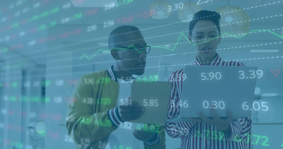 Business Professionals Analyzing Digital Stock Data in Modern Office