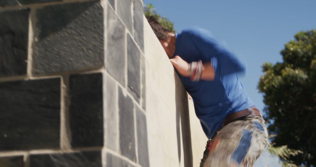 Man Climbing Stone Wall in Outdoor Activity - Free Images, Stock Photos and Pictures on Pikwizard.com