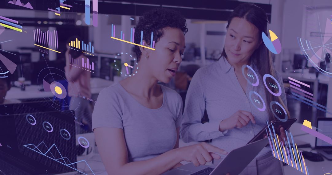 Data-Driven Business Women Analyzing Financial Graphs