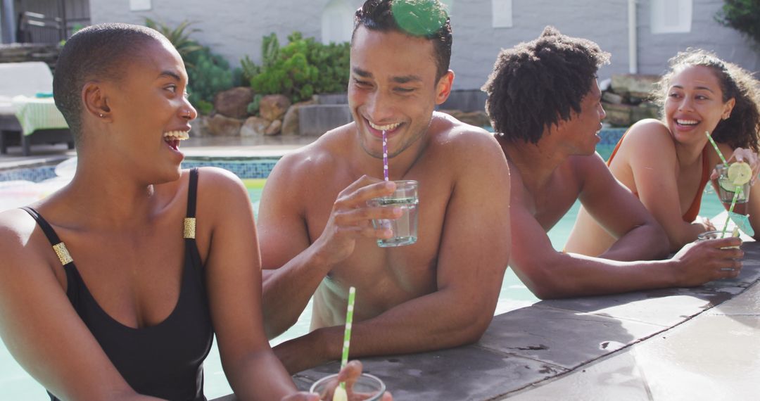 Diverse Friends Enjoying Poolside Drinks Laughing