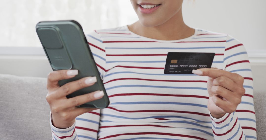 Woman Making Online Payment with Credit Card and Smartphone at Home - Free Images, Stock Photos and Pictures on Pikwizard.com