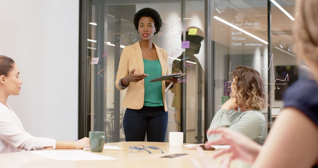 Diverse Businesswomen Conducting Creative Meeting in Modern Office