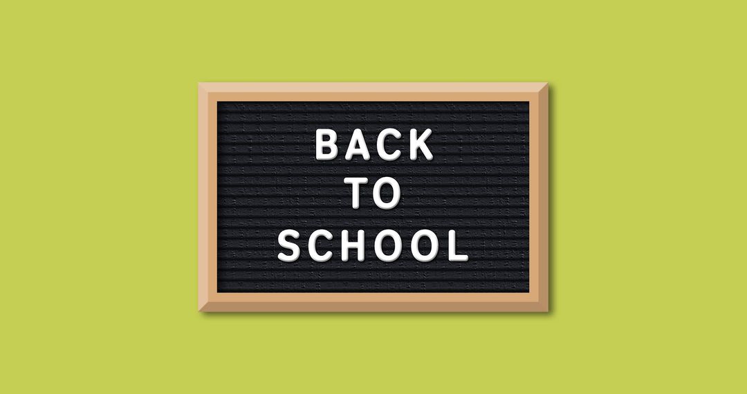 Back to School Chalkboard Sign on Yellow Background - Free Images, Stock Photos and Pictures on Pikwizard.com