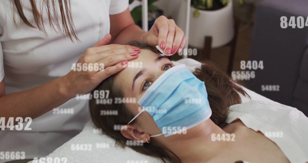 Facial Treatment with Overlayed Data Imagery in Spa Environment