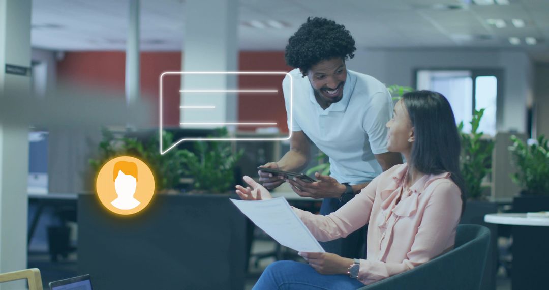 Colleagues Collaborating with Digital Communication in Modern Workspace