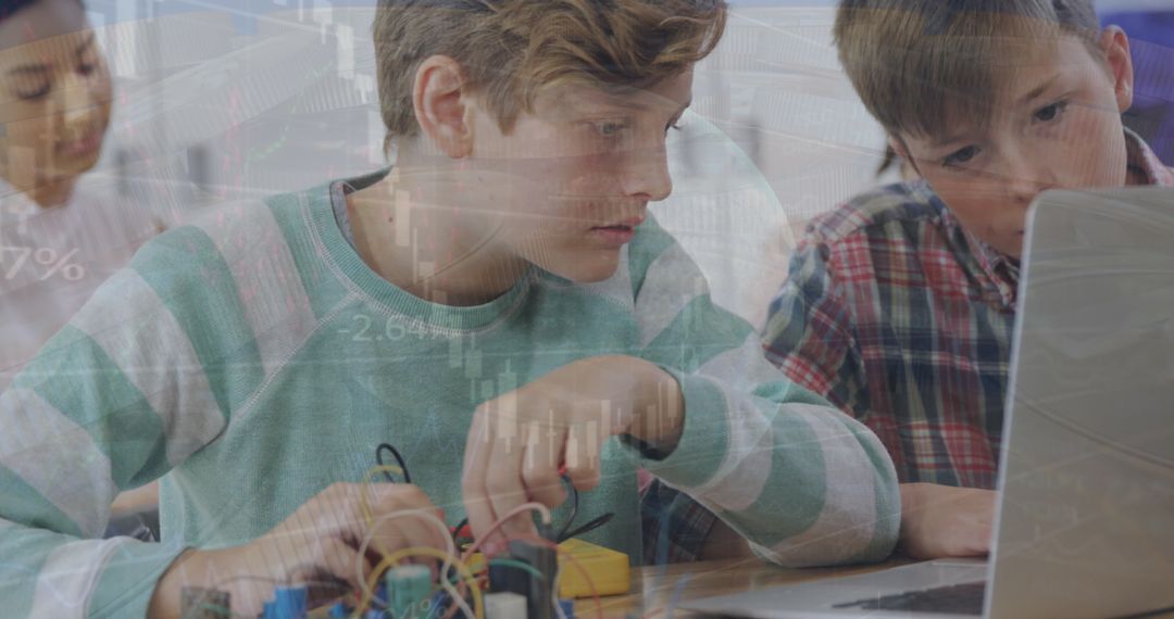 Caucasian Students Using Laptop with Global Business Overlay