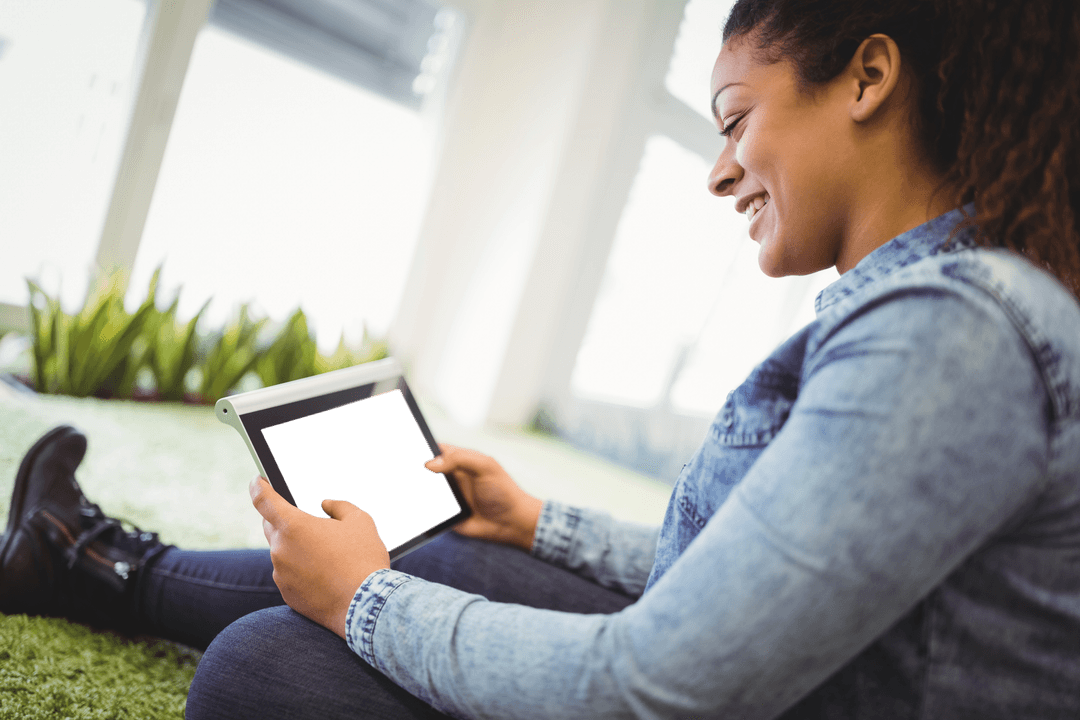 Businesswoman with Transparent Screen Tablet in Modern Office