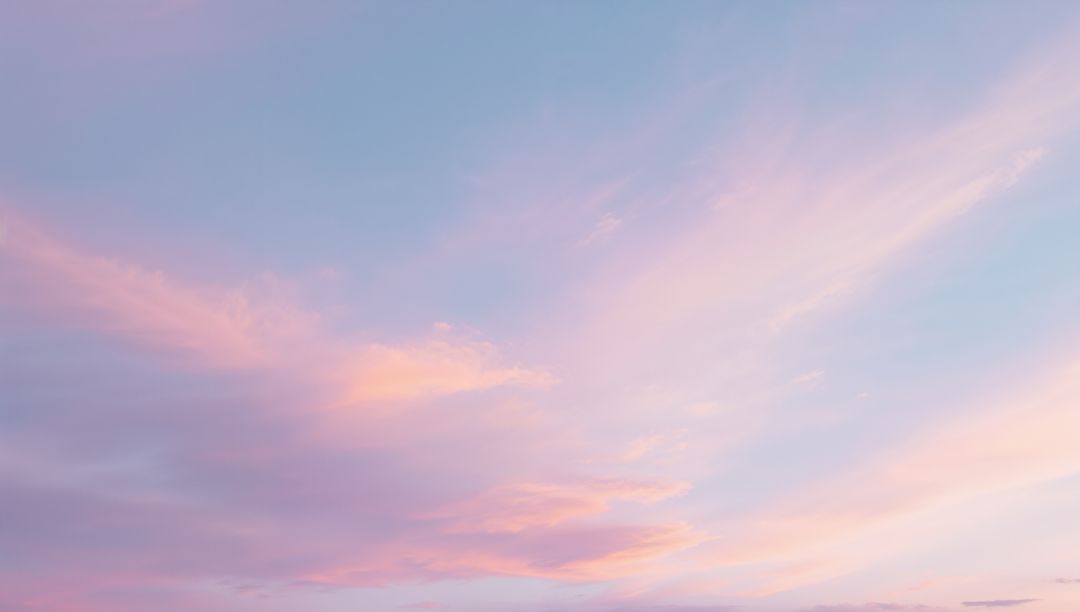 Pastel Sunrise Sky Filling Frame with Lavender Peach Clouds and Serene Dawn Gradient