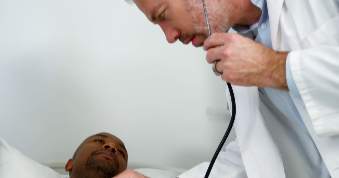 Doctor Examining Patient with Stethoscope in Hospital - Free Images, Stock Photos and Pictures on Pikwizard.com