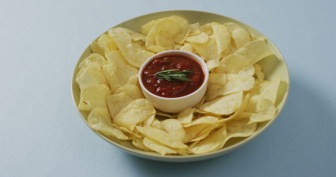 Plate of Potato Chips with Salsa Dip on Light Background - Free Images, Stock Photos and Pictures on Pikwizard.com