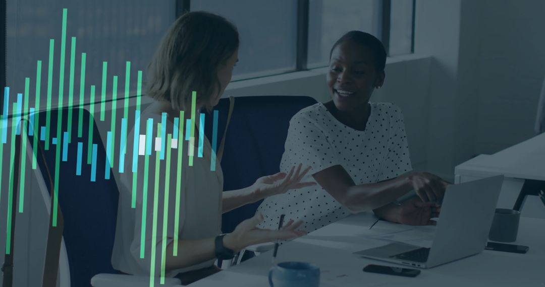 Two Professionals Analyzing Financial Data in Modern Office