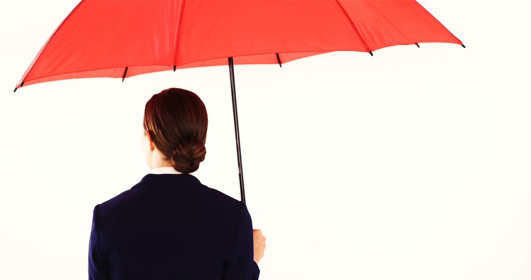 Businesswoman Holding Red Umbrella Facing Away on White Background - Free Images, Stock Photos and Pictures on Pikwizard.com