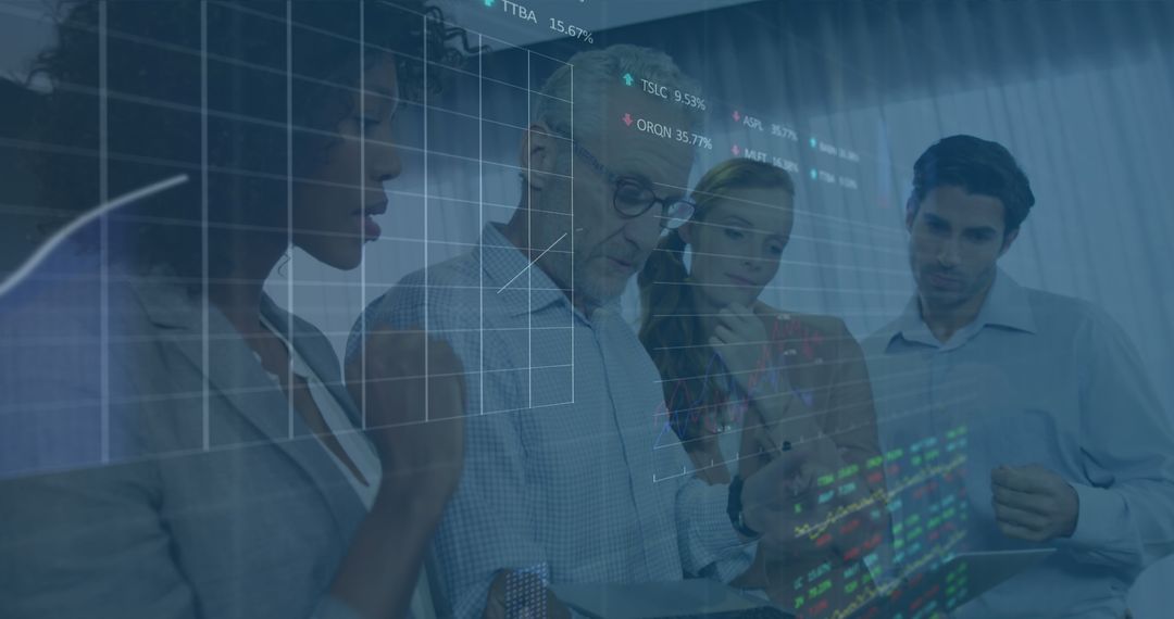 Diverse Team Analyzing Stock Market Data on Laptop in Office