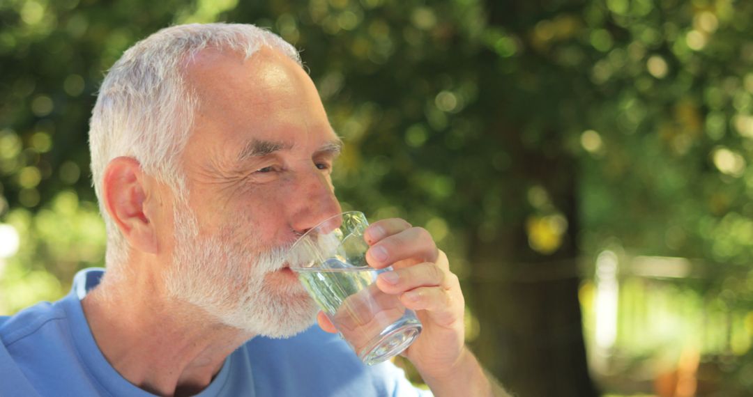 Senior Man Drinking Water Outdoors - Free Images, Stock Photos and Pictures on Pikwizard.com