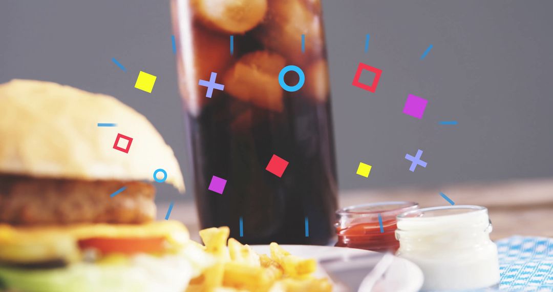 Delicious Classic Burger with Refreshing Soda and Condiments