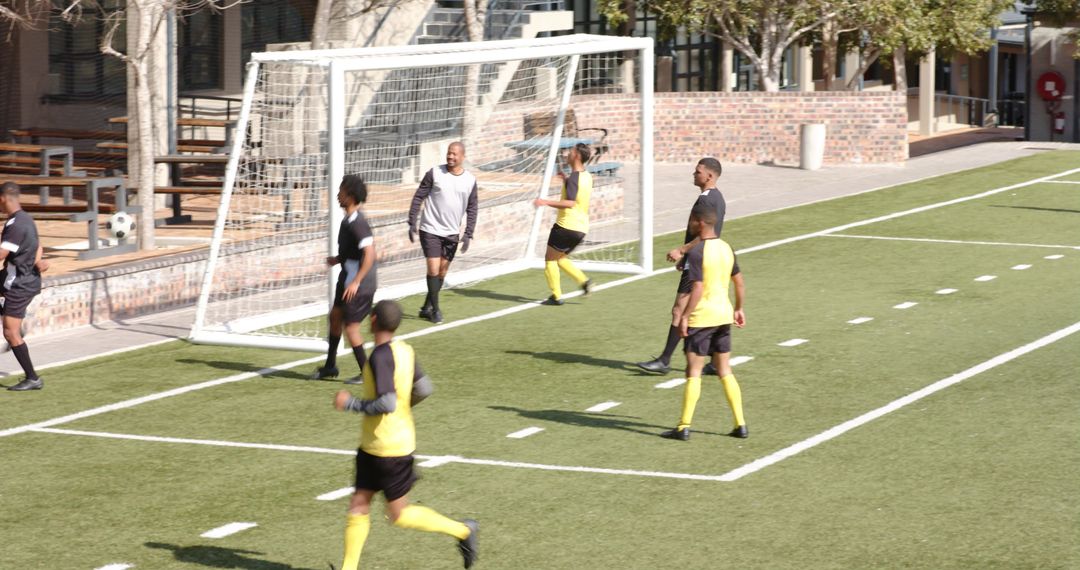 Soccer Team Warming Up Before Competitive Match on Field