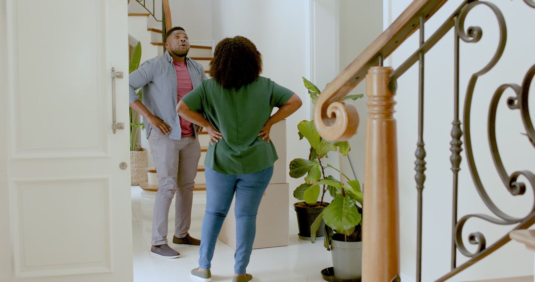 Couple Plans Home Setup by New Staircase