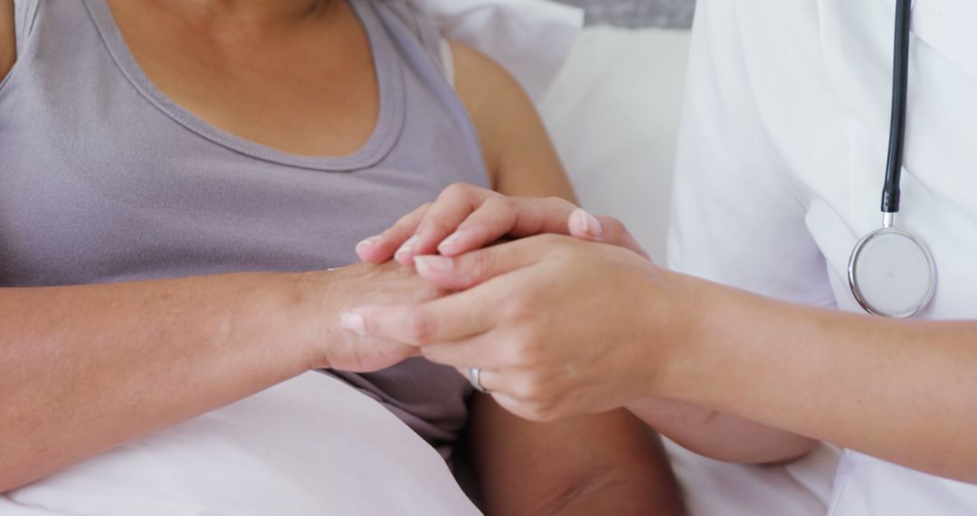 Nurse Holding Elderly Patient's Hands with Care - Free Images, Stock Photos and Pictures on Pikwizard.com