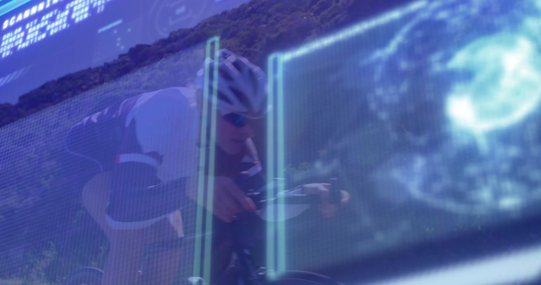 Cyclist on Hillside Road with Futuristic Digital Display Overlay