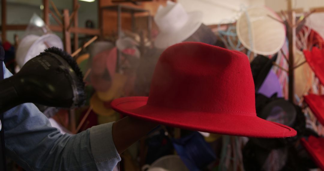 Artisan Steaming Red Felt Hat in Workshop - Free Images, Stock Photos and Pictures on Pikwizard.com