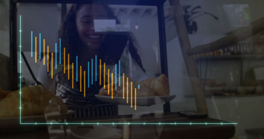 Smiling Baker Placing Croissants in Display Case at Bakery