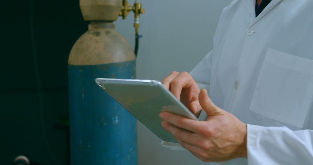 Medical Professional Using Tablet in Laboratory - Free Images, Stock Photos and Pictures on Pikwizard.com