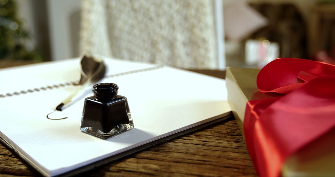 Inkwell and Quill with Notebook on Wooden Table - Free Images, Stock Photos and Pictures on Pikwizard.com