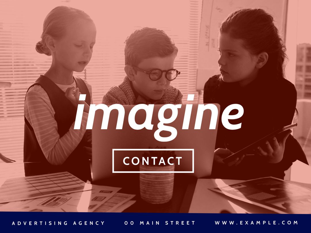 Focused Children Collaborating Over Creative Project in Office