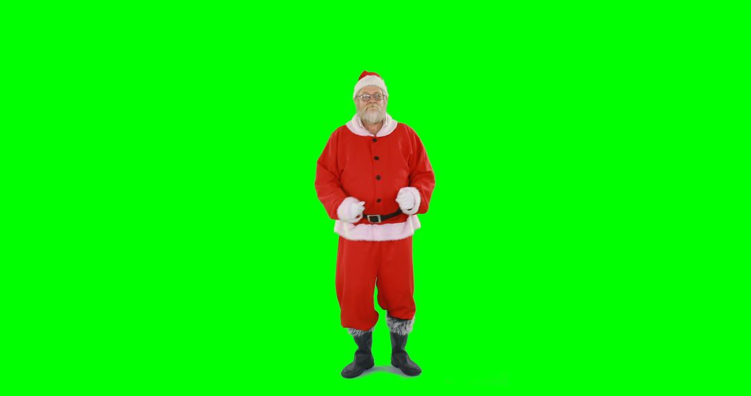 Santa Claus standing on green chroma key - Free Images, Stock Photos and Pictures on Pikwizard.com