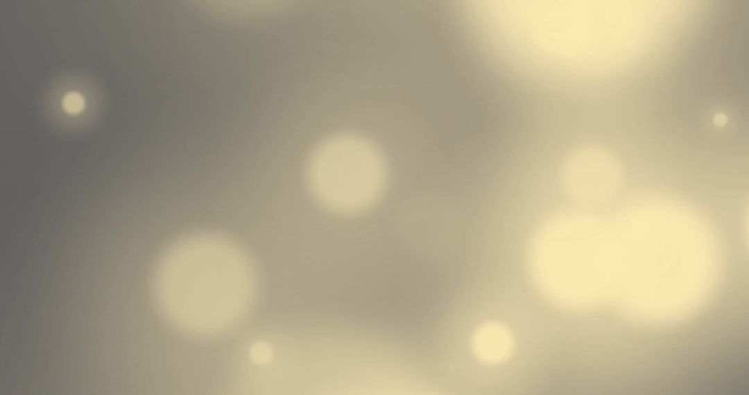 Abstract Glowing Light Spots on Soft Grey Background